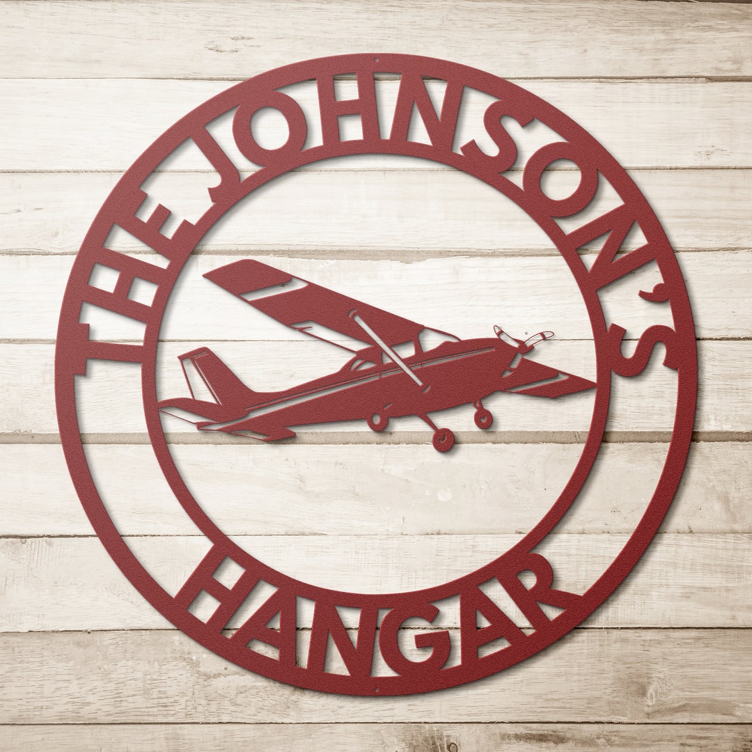 Red Cessna hangar sign
