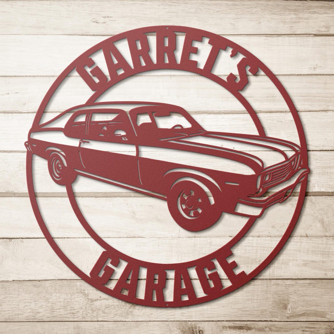 Red Chevy Nova garage sign on wood background